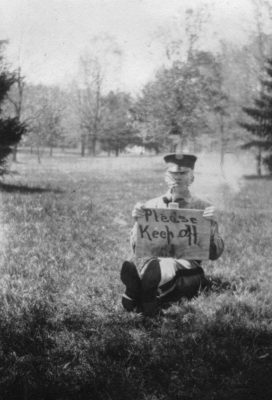 Cadet on the "Please Keep Off" Sign