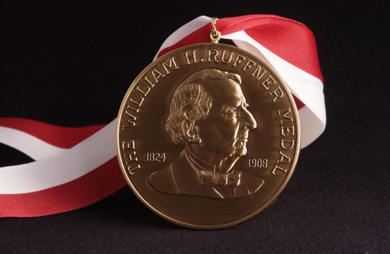 Ruffner Medal, a bronze medal with an image of William Ruffner, on a red and white ribbon