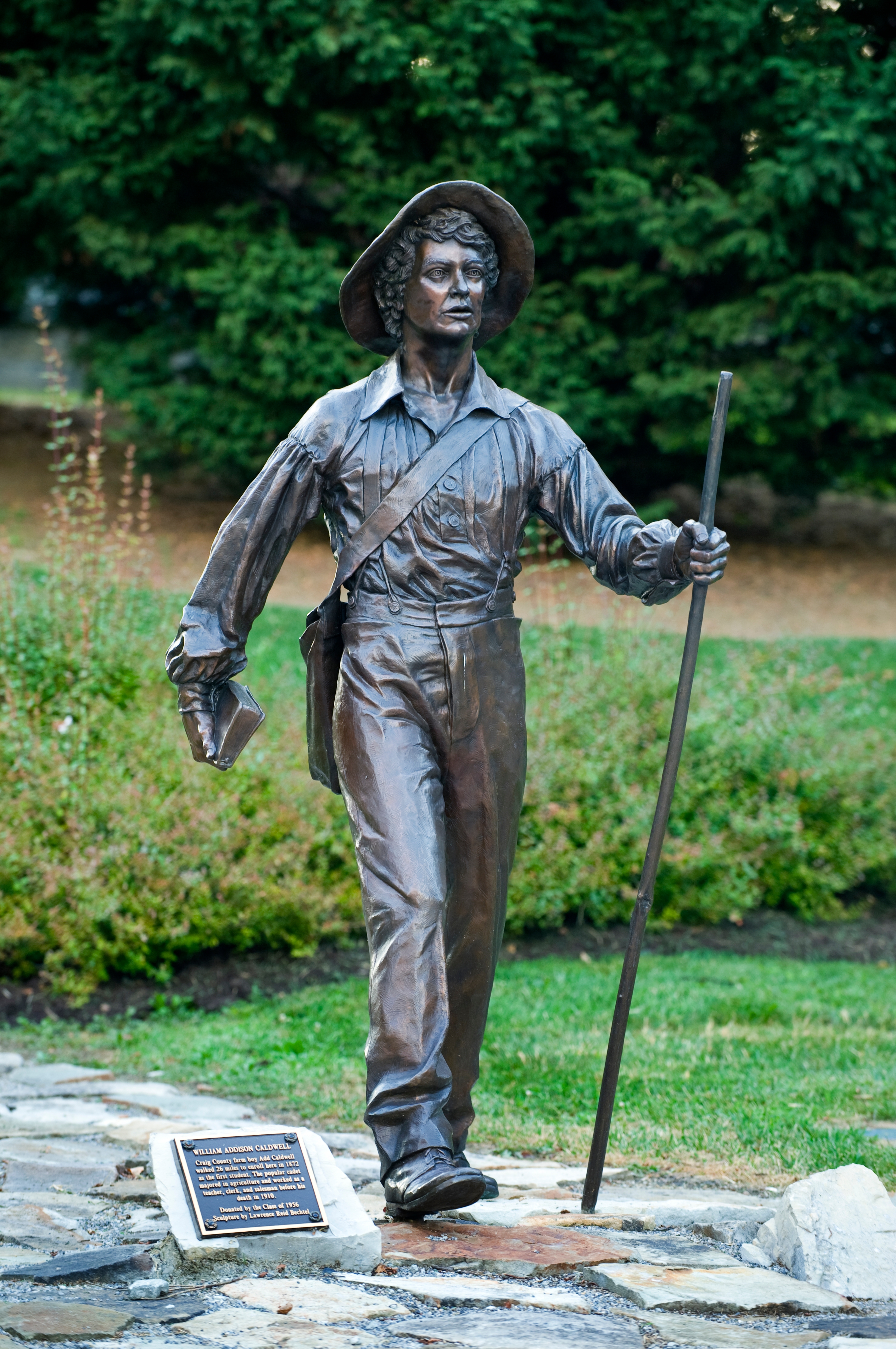 Picture of the statue of Addison Caldwell, the first student to enroll in Virginia Tech.